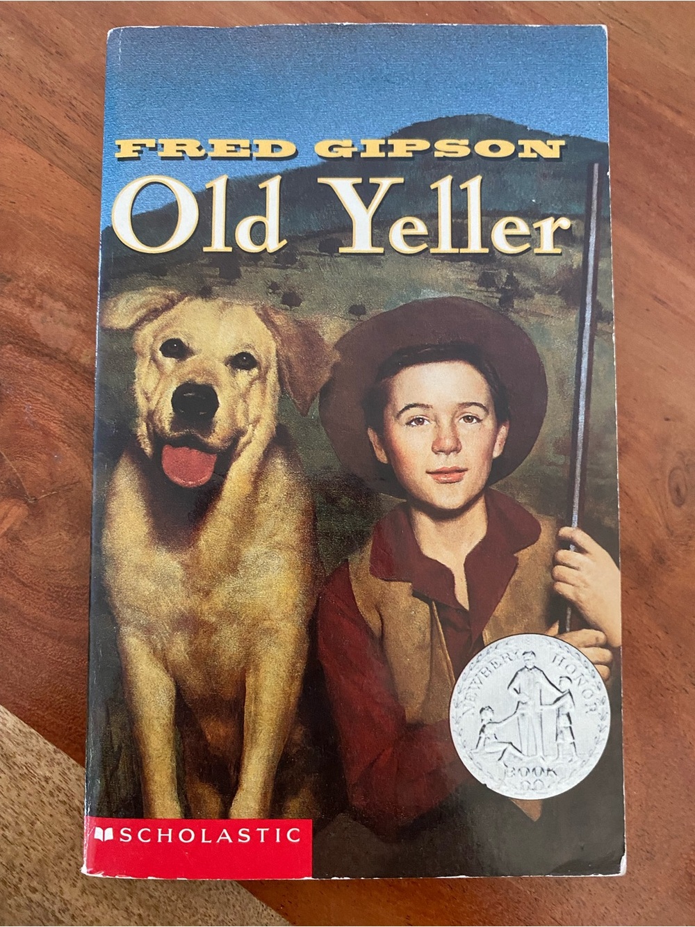 Scholastic Paperback with Yellow Cover and Blue Accents